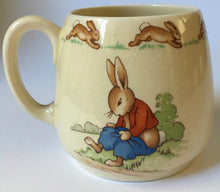 Load image into Gallery viewer, Royal Doulton Bunnykins - HW 12 Family at Breakfast / HW 2 Pulling on trousers - Don Mug BARBARA VERNON
