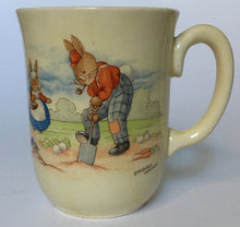 Load image into Gallery viewer, Royal Doulton Bunnykins - HW 9 Gardening style one HW13R Footballer - Rare combination - Don beaker &quot;Bunnies inside&quot; BARBARA VERNON
